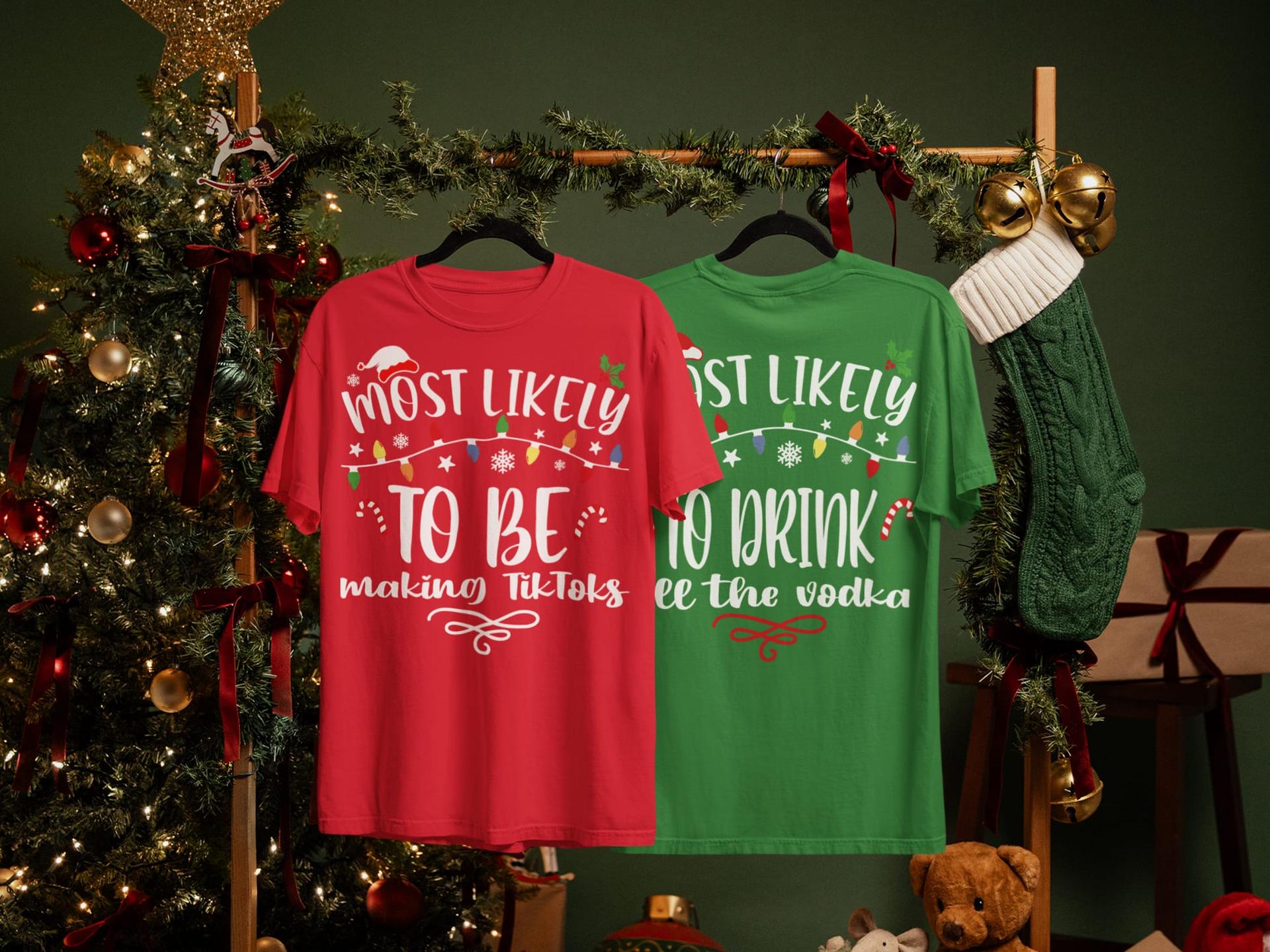 Two custom “Most likely to” shirts on hangers by the Christmas tree