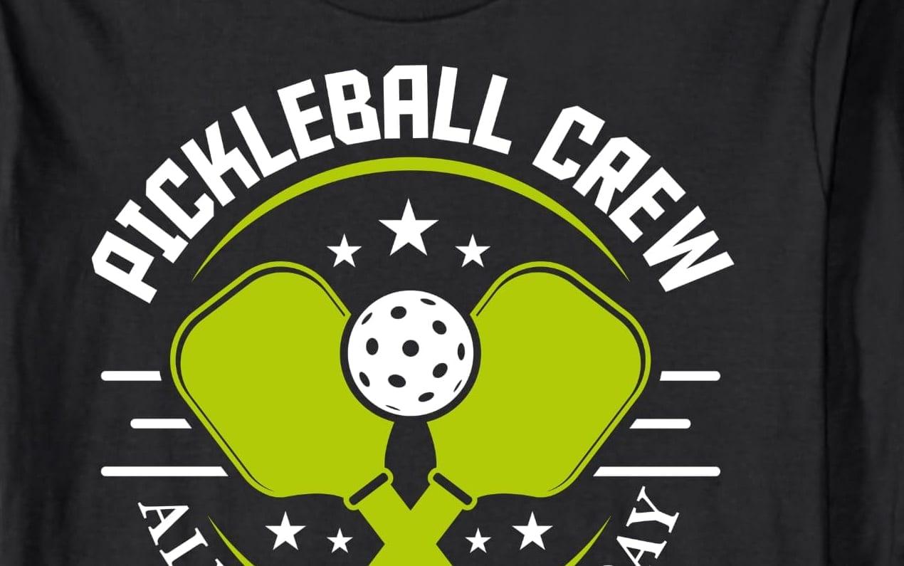 A black Pickleball Crew shirt with crossed paddles
