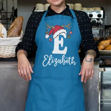 A blue apron printed with a Santa-hat E and the name Elizabeth